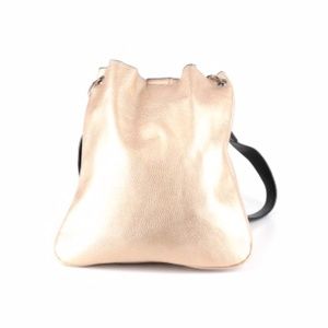 CO LAB Golden purse with inside leopard zip and snap closure.